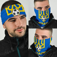 Blue Ukraine soccer bandana over face with yellow trident, ball, and UKRAINE lettering