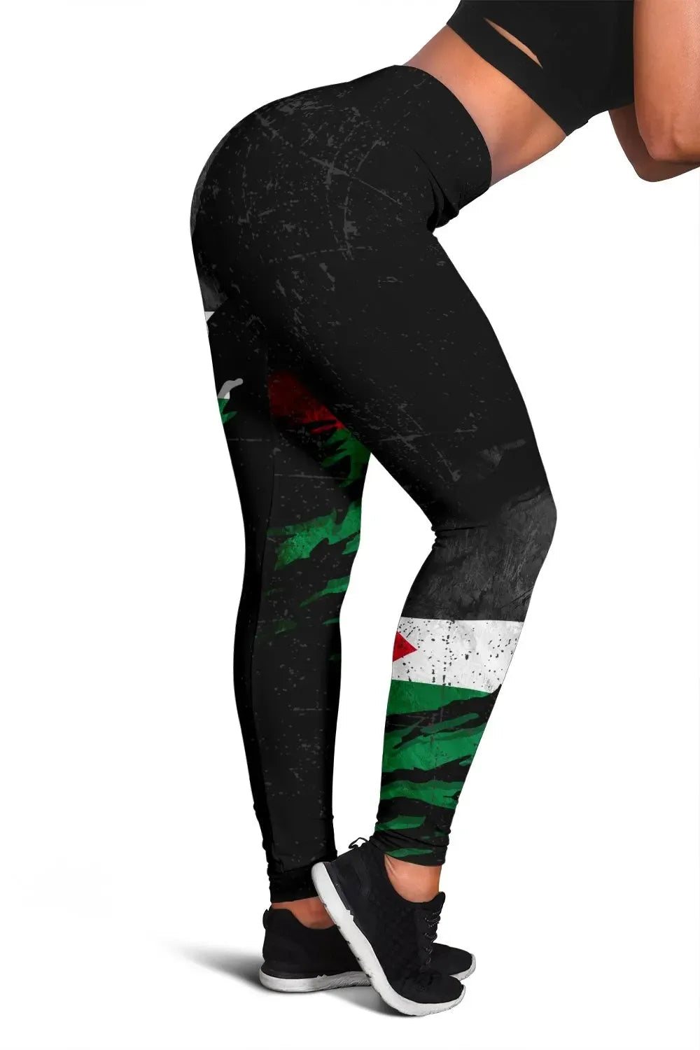 Black women’s leggings with grunge flag-style print in green, red, and white