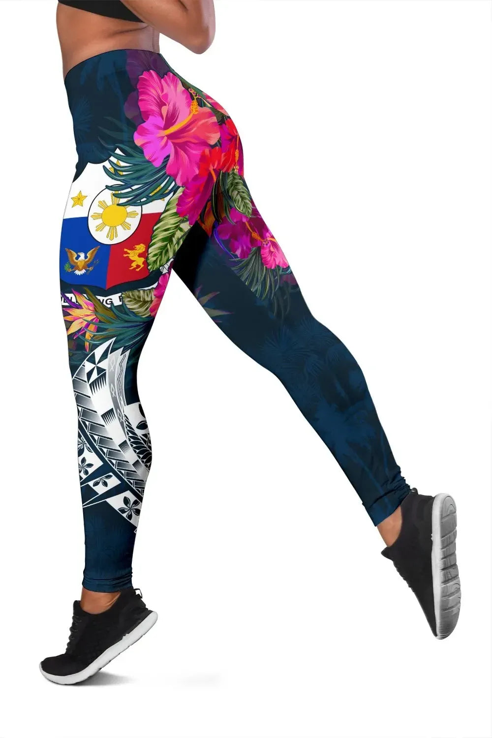 Women’s leggings with dark blue tropical floral and palm print, full length.