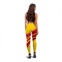 Back view yellow leggings with red diagonal stripe pattern and gold lines