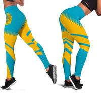 Teal leggings with yellow graphic stripes, full-length pattern view