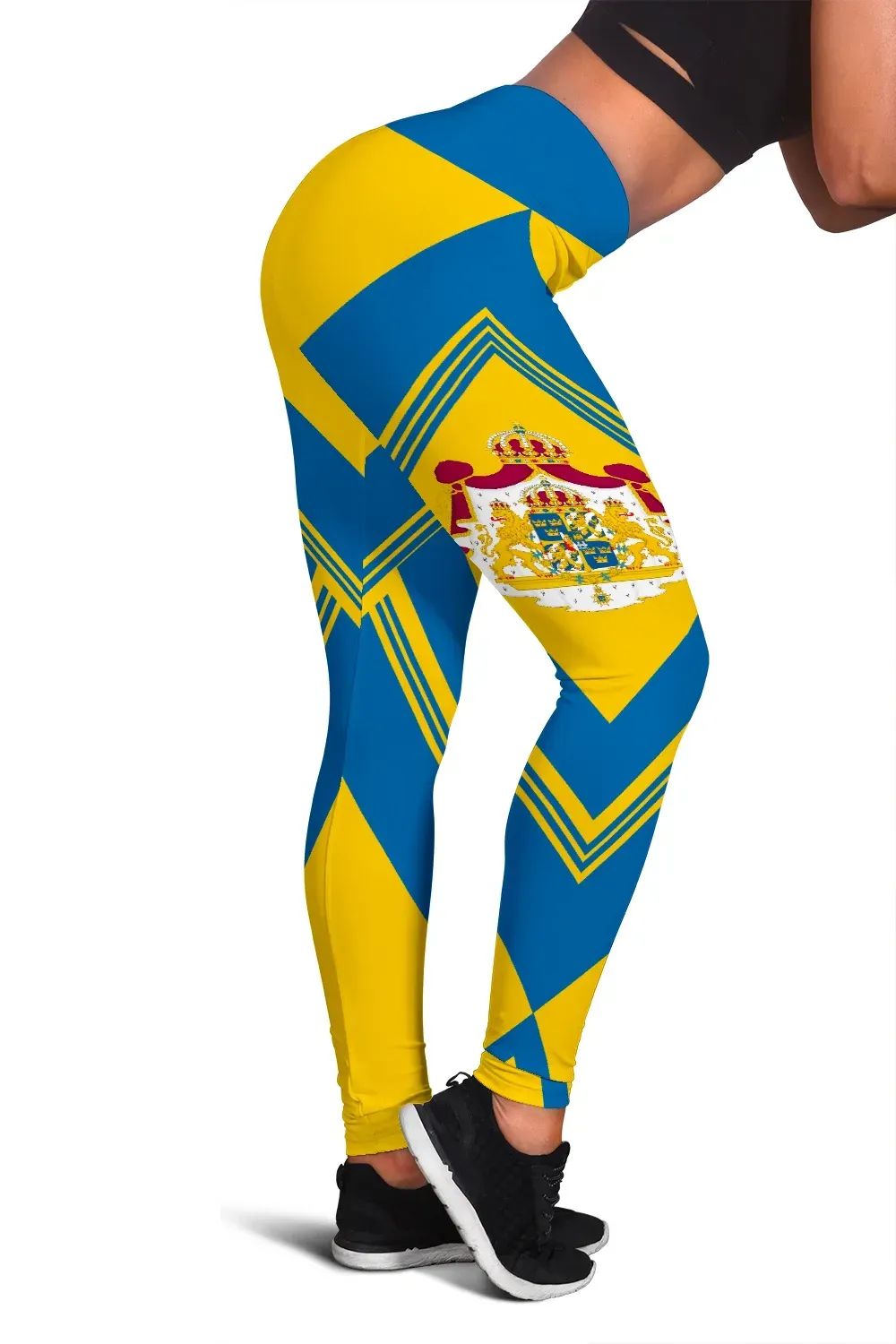 Yellow and blue geometric leggings with crest graphic
