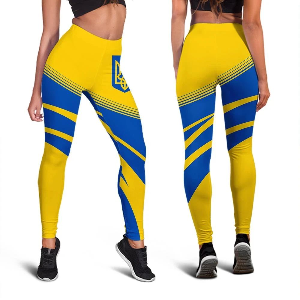 Front view yellow & blue diagonal striped leggings with Ukrainian coat of arms panel