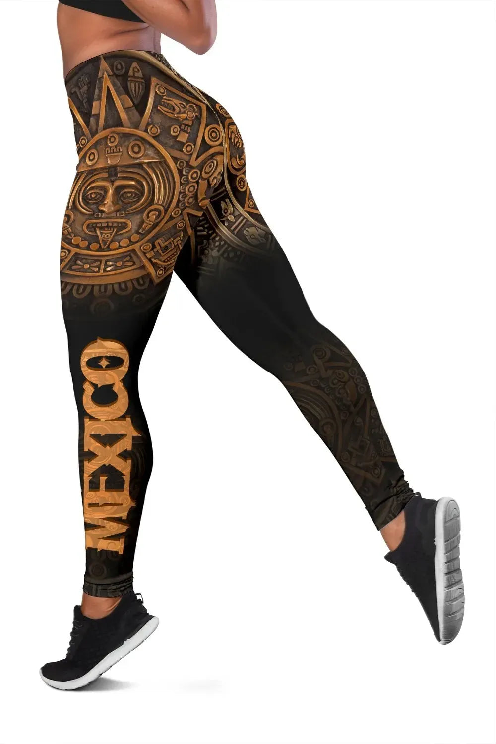 Black leggings with gold-brown Aztec calendar art print on thighs and calves.
