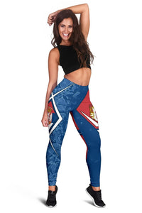 Full-length front: blue leggings with red side panels, Serbian crest and white chevron