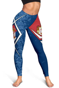 Knee-to-ankle view: blue leggings with red panel and Serbian crest accents, white borders