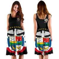 Black sleeveless dress shown front and back, Panama crest graphic on skirt