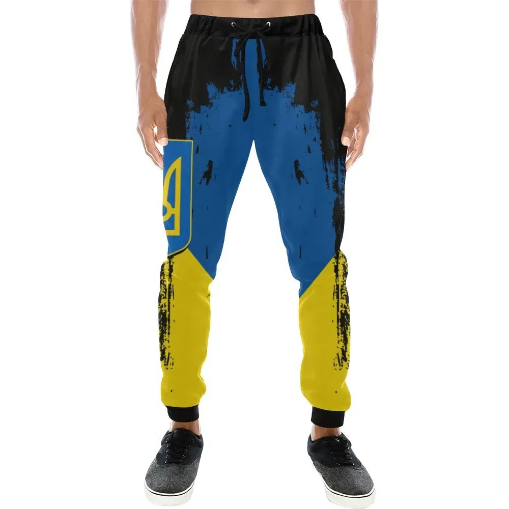 Colorful jogger sweatpants, black waistband with drawstring, blue center and yellow lower