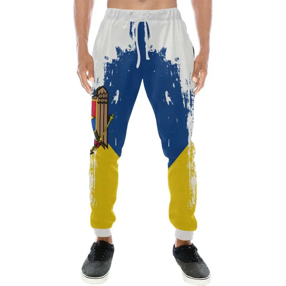 White jogger sweatpants with blue-yellow paint graphic and drawstring waist