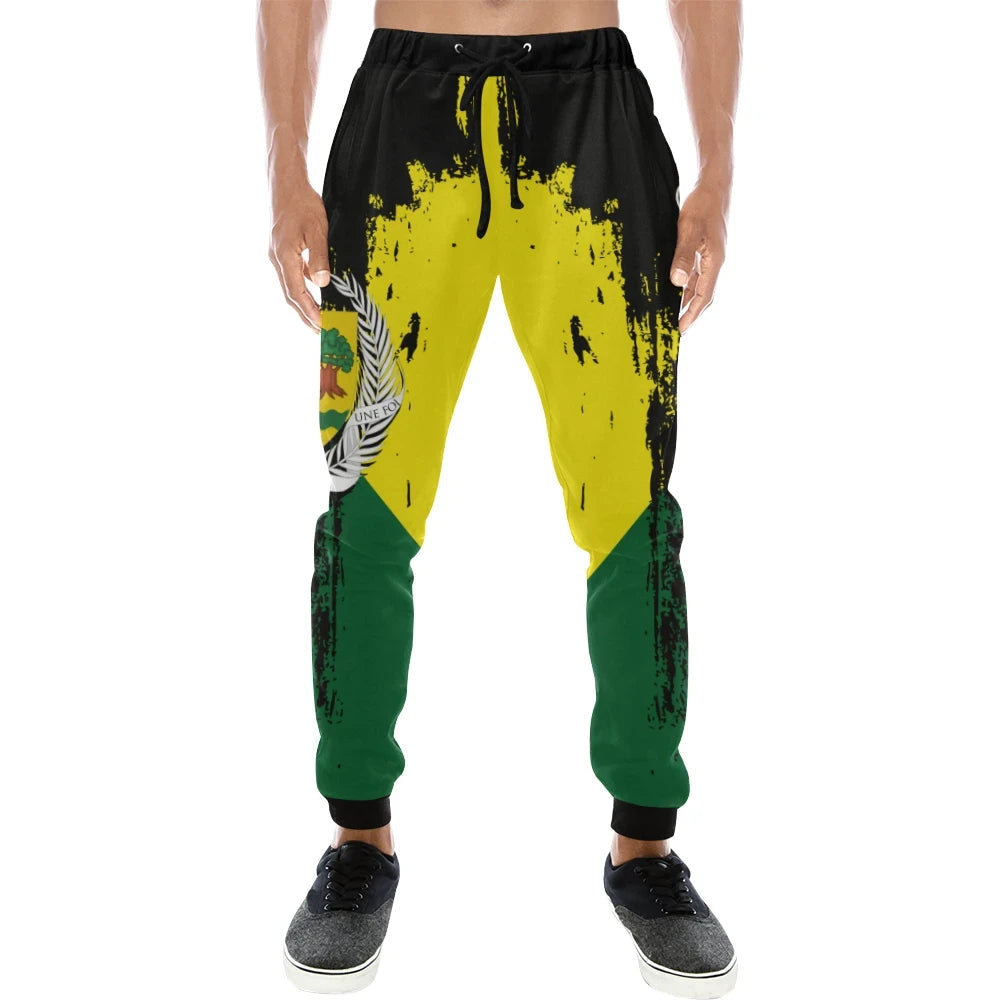 Colorful graffiti-style sweatpants with black drawstring waist, yellow and green front panels.