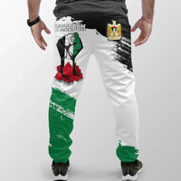 Black-and-white jogger with Palestinian flag-style stripes, Freedom text, and emblem
