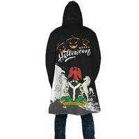 Black hooded Halloween coat back: 'Happy Halloween' lettering with unicorn and jack-o'-lanterns