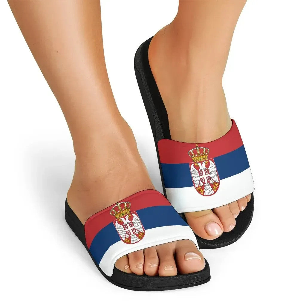 Serbia flag slide sandals worn; black footbed with red blue white strap