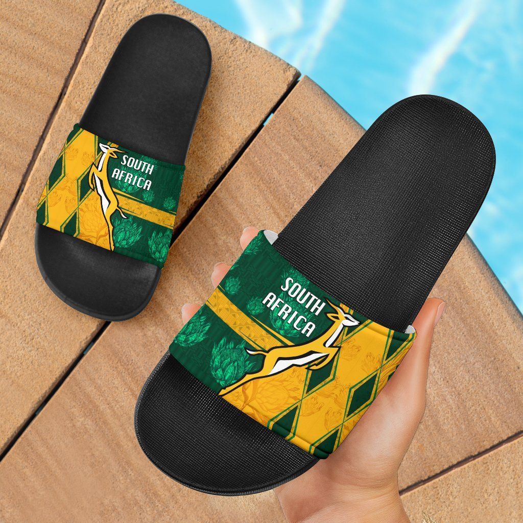 South Africa slide sandals with black footbed and yellow-green printed strap