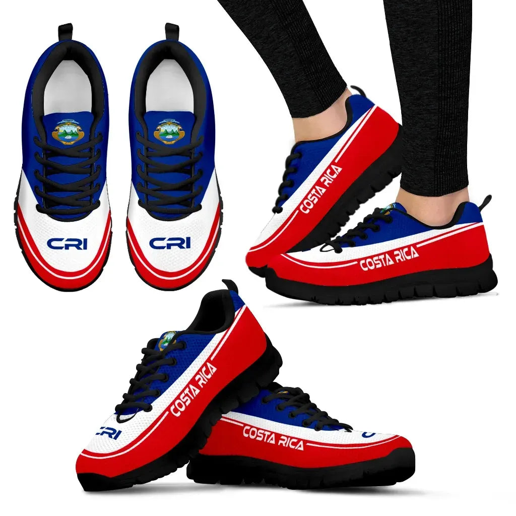 Costa Rica sneakers, dark outsole with blue upper and red side stripe, black laces