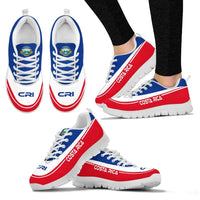 Costa Rica sneakers, white upper with blue laces and red side stripe, chunky white sole