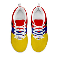 Colombia Rising sneakers pair view, yellow uppers with blue-red accents and white laces