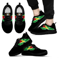 Black sole low-top sneakers, multicolor wing motif across the side and toe