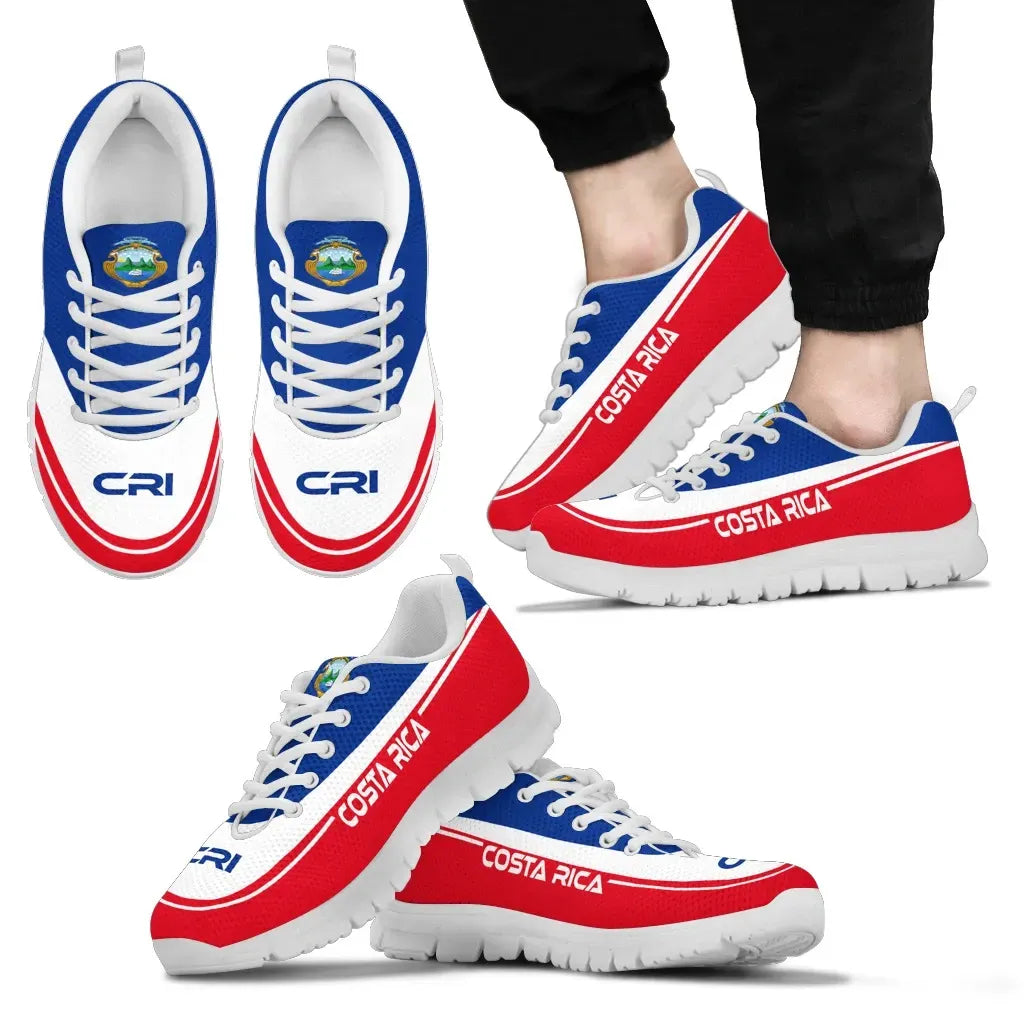 Costa Rica sneakers on feet, white upper with blue laces, red side stripe, white sole