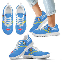 Aruba Rising Sneaker blau mit weißer Sohle, ARUBA-Aufdruck, Ansicht am Fuß