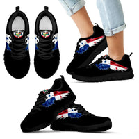 Black low-top sneakers with red-blue wing print and black lace-up front