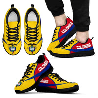 Colombia active sneakers, yellow upper with red and blue panels, black outsole.