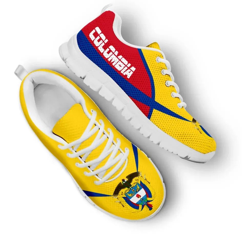 Colombia active sneakers, yellow upper with red and blue stripe accents, white sole.