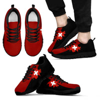 Red and black Swiss map cross sneakers, black outsole, worn on feet, lace-up
