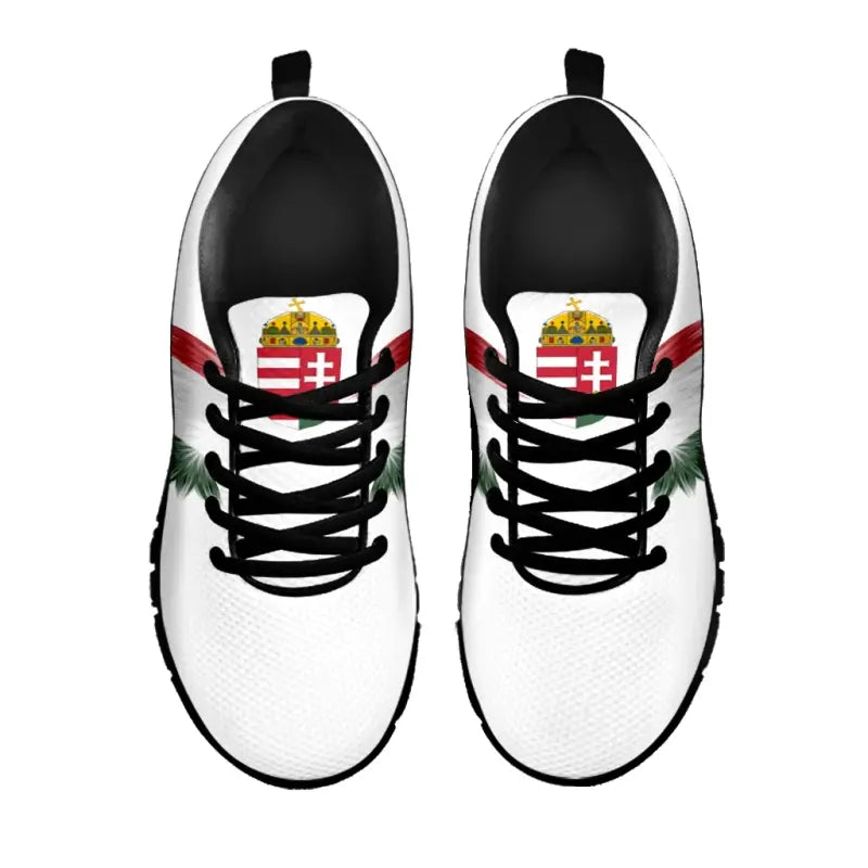 White sneakers with Hungary emblem near laces and wing print, black laces