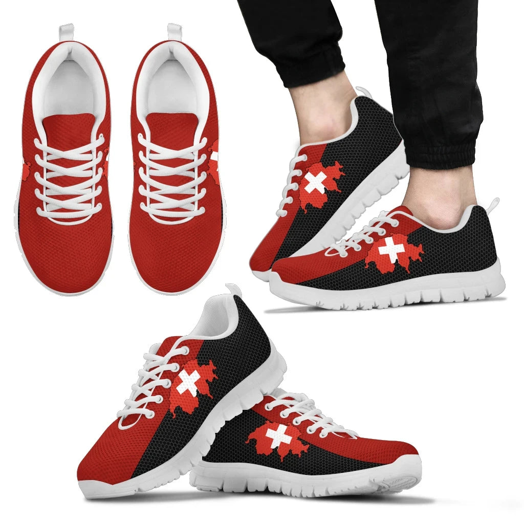 Red and black Swiss map cross sneakers with white outsole, white laces, on feet