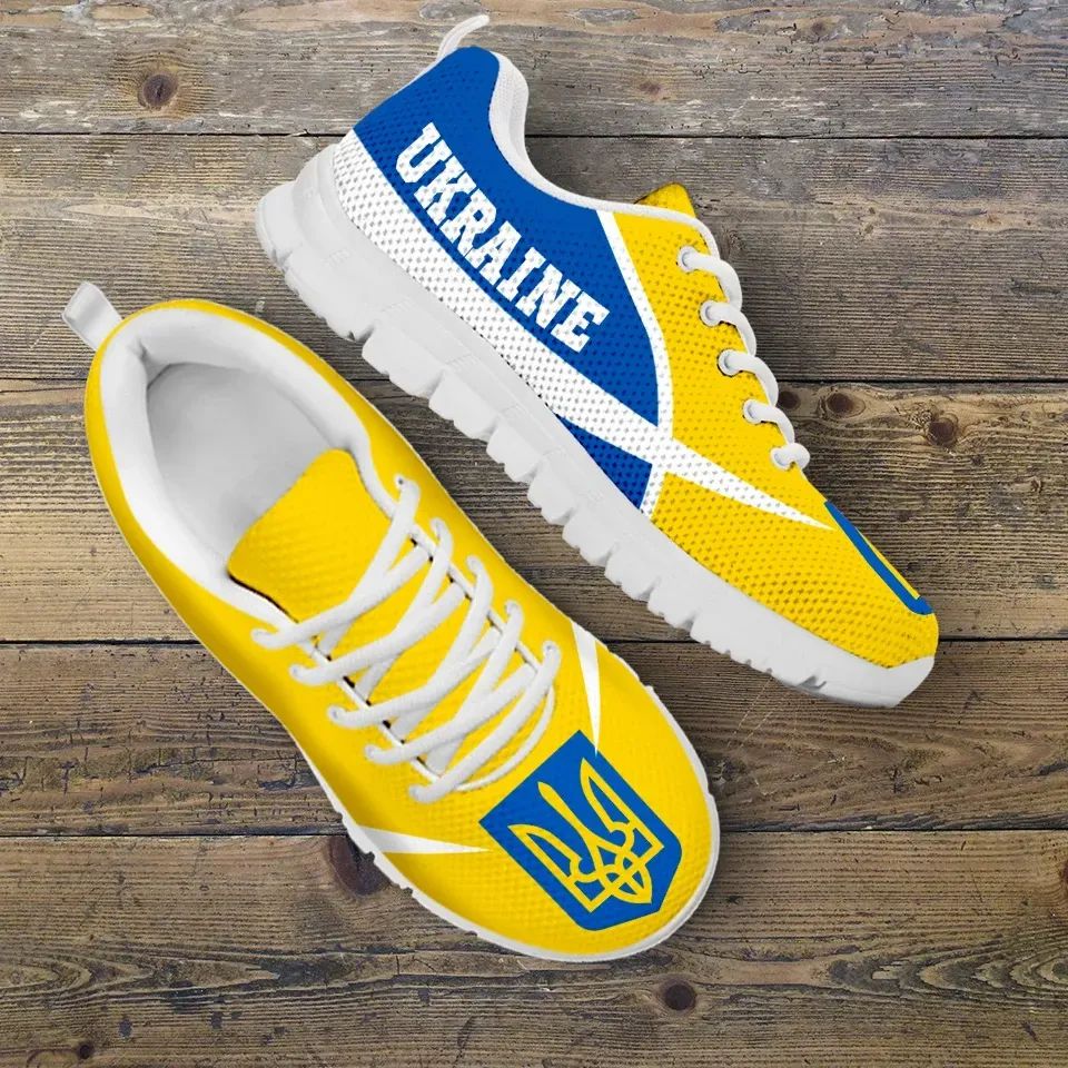 Ukraine active sneakers with yellow uppers, blue stripe, white sole, lace-up design