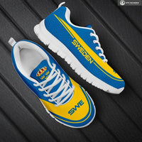 Sweden sneakers, blue and yellow with white laces and white sole, side view