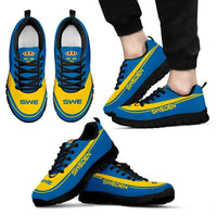 Sweden sneakers, blue and yellow uppers with black laces, black sole, angled side