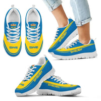 Sweden sneakers blue and yellow, white laces and white sole, on legs with jeans