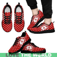 Red Swiss-cross sneakers with black sole, white laces and patterned cross fabric