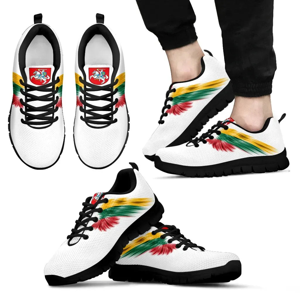 White mesh sneakers with black sole, black laces, multicolor wing graphic and crest.
