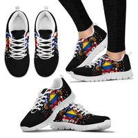 Front and side view of black sneakers with open hand Colombia flag print, white laces