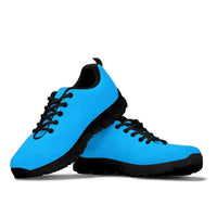 Pair of blue Saint Lucia sneakers, side view with crest graphic, black outsole