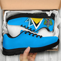 Blue sneakers in box, crest and flag graphic on side, black outsole