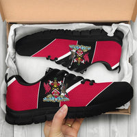 Red and black Trinidad sneakers with crest badge, black laces, chunky black sole