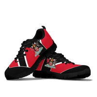 Red and black Trinidad sneakers, crest logo on side, black laces, rugged black tread sole