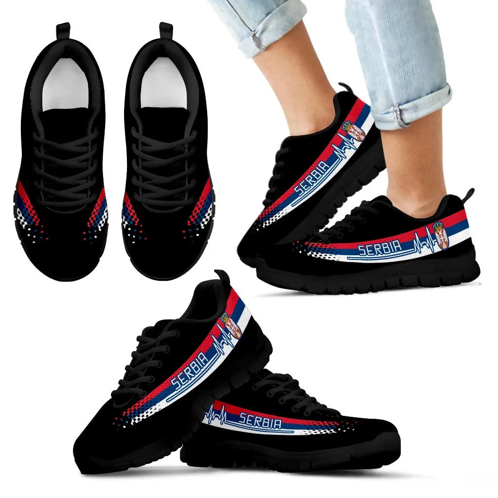 Serbia heartbeat sneakers, angled view of black pair with flag stripe and black soles