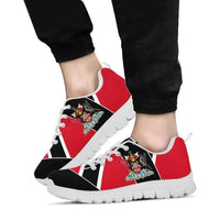 Red and black Trinidad sneakers on feet, white laces, crest emblem, white tread sole