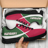 Hungary active sneakers in box, red/green uppers with black sole and white stripe
