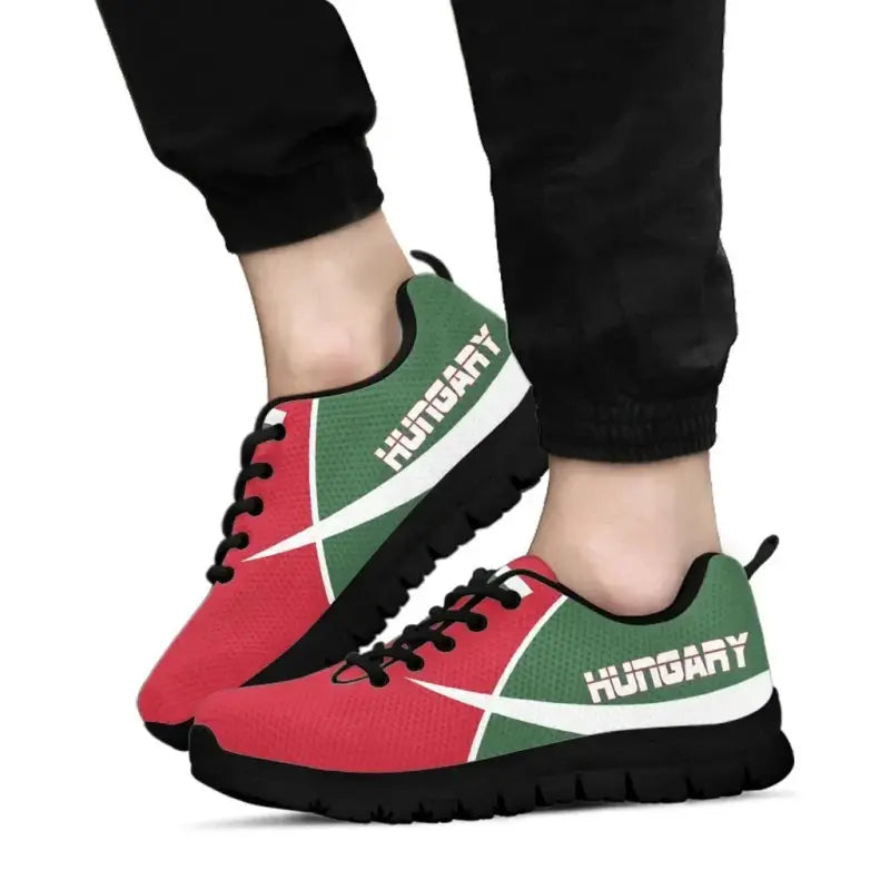 Hungary active sneakers worn, red and green uppers with black tread sole