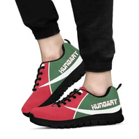 Hungary active sneakers worn, red and green uppers with black tread sole