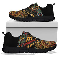 Aztec calendar print sneakers on box, black mesh uppers with multicolor artwork, black sole