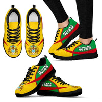 Active sneakers with yellow, green & red print, black sole, lace-up
