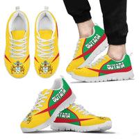 Active sneakers with yellow, green & red print, white sole, front and side