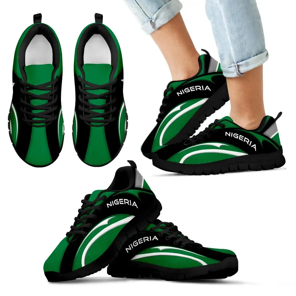 Nigeria flag low-top sneakers, green stripes, “NIGERIA” branding on side, black sole